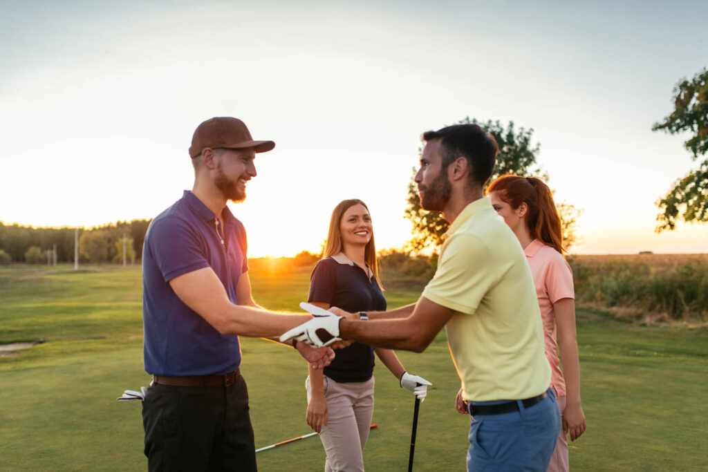 Group of people at a golf outing.